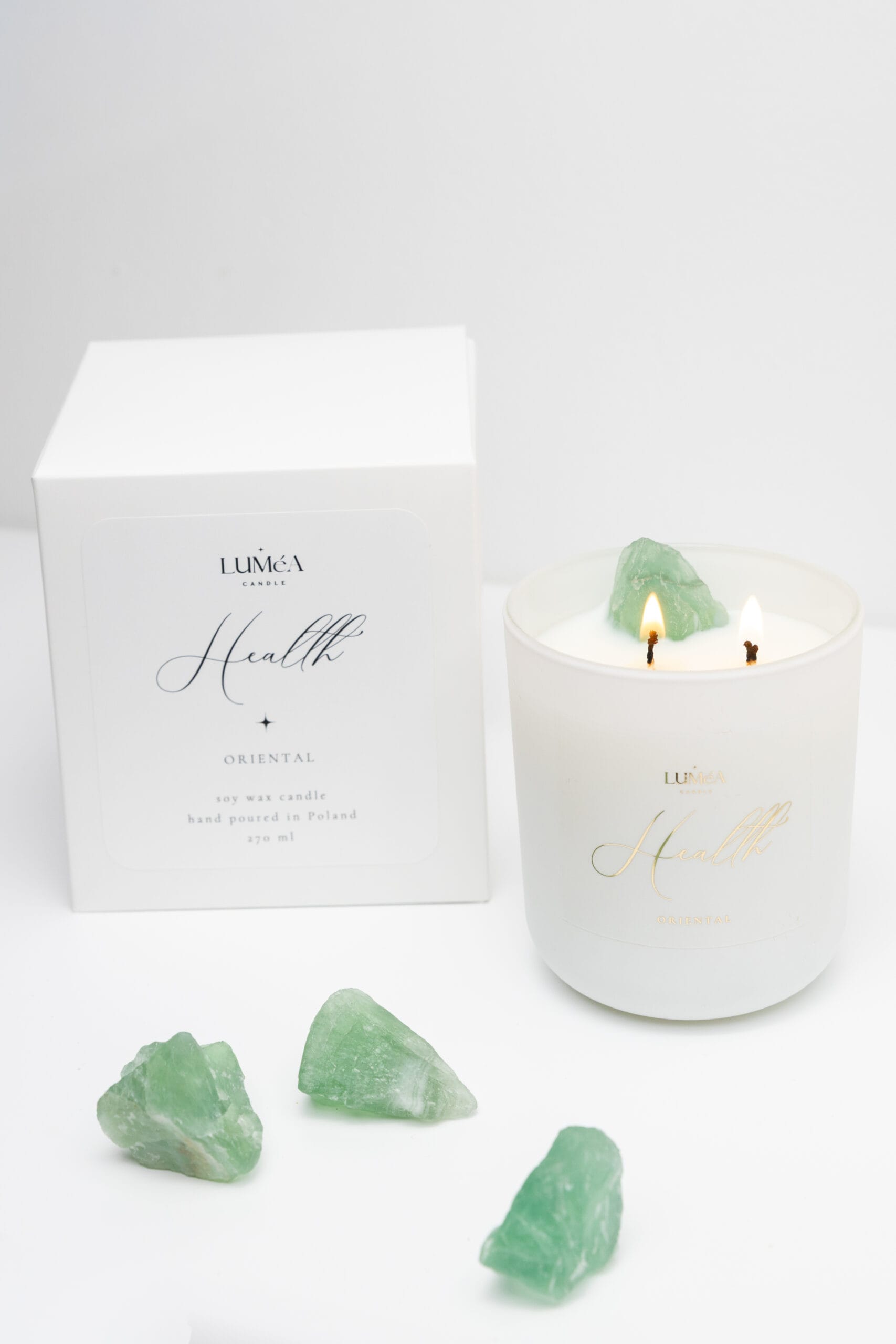 Świeca sojowa Luméa Candle z kamieniem naturalnym jako element dekoracji wnętrza